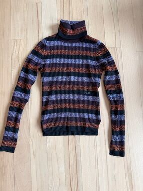 Ganni Striped Turtleneck Sweater in Black, Purple & Rust